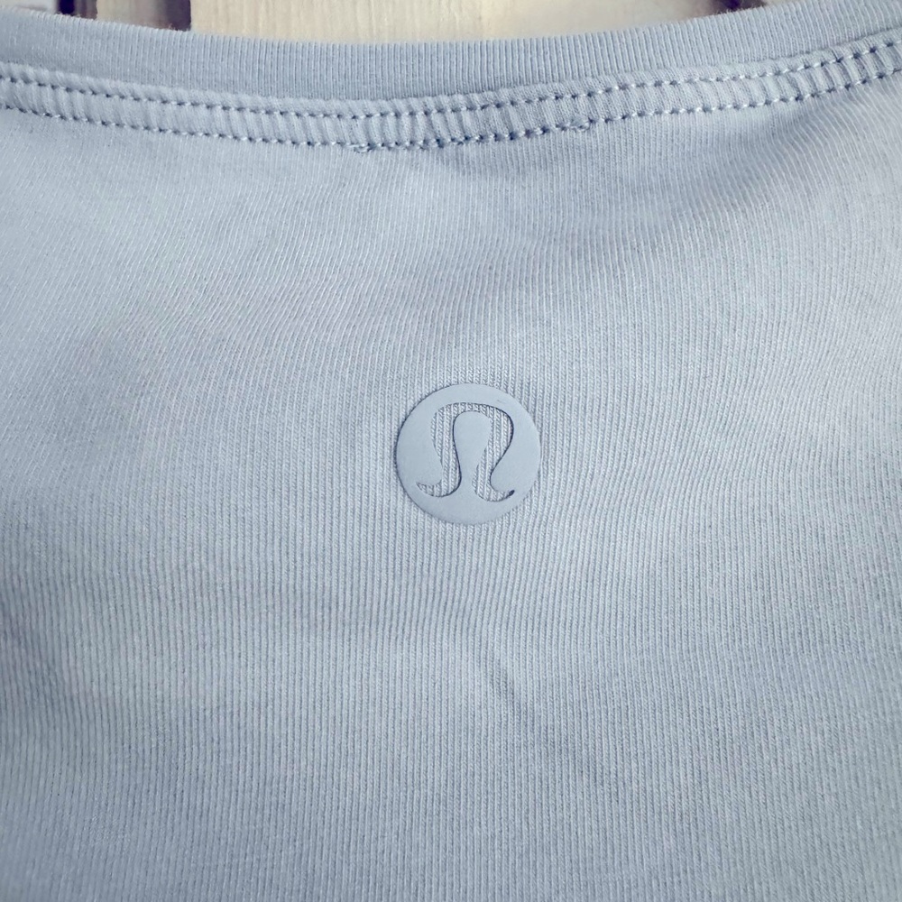 Lululemon back in action dress size 8. Light Blue